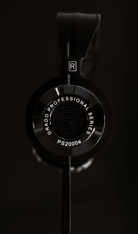 Photo of PS2000e headphones from the side on a black background