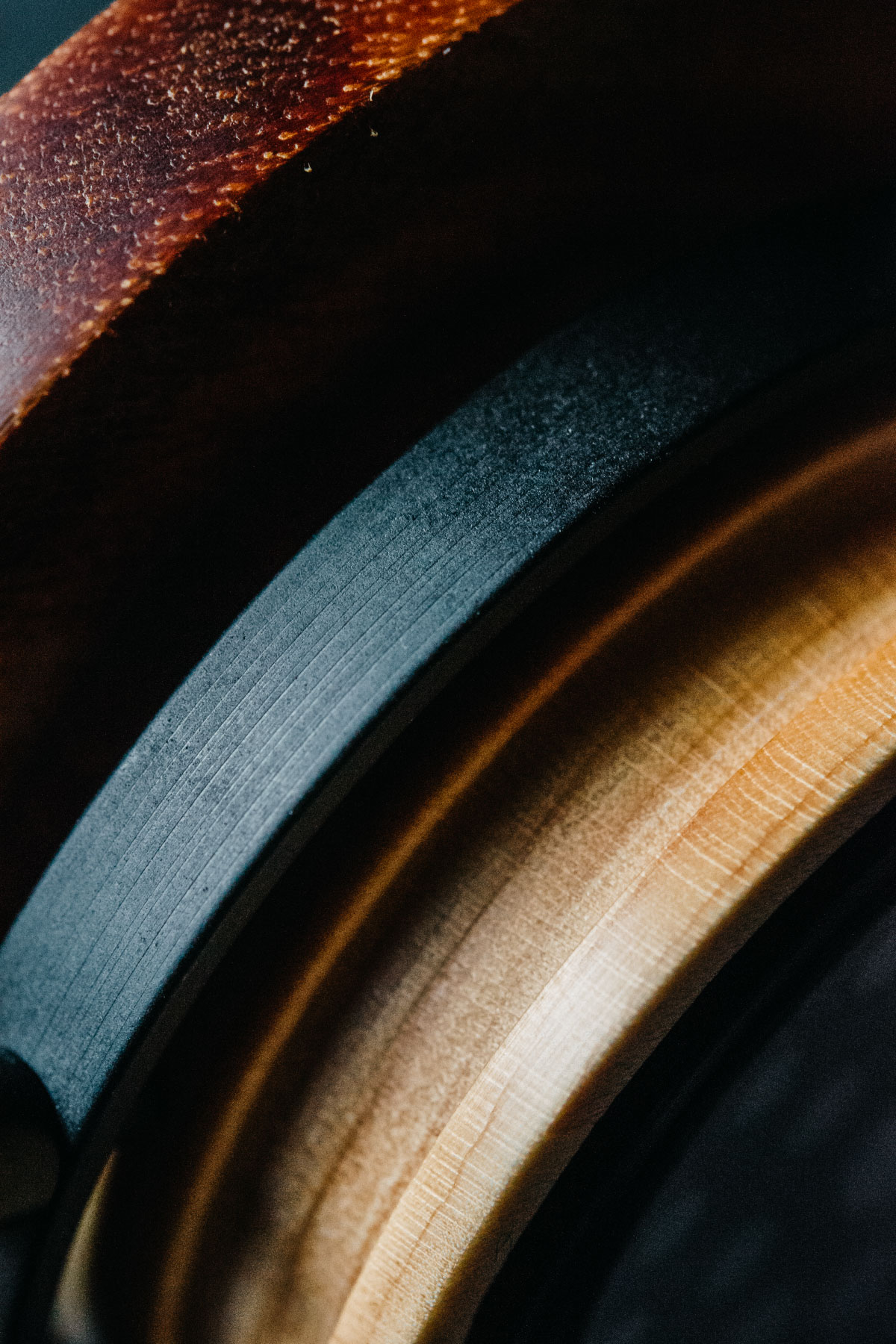 Closeup of gs2000e headphones showing details of wood and leather.