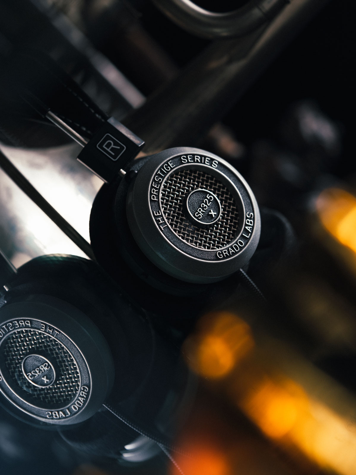 Photo of SR325x headphones with a blurred background.
